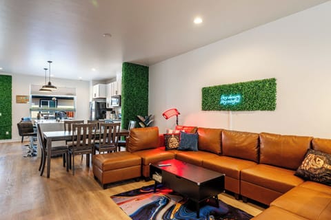 Living Room with Modular Couch that can have a queen topper added! (In closet)