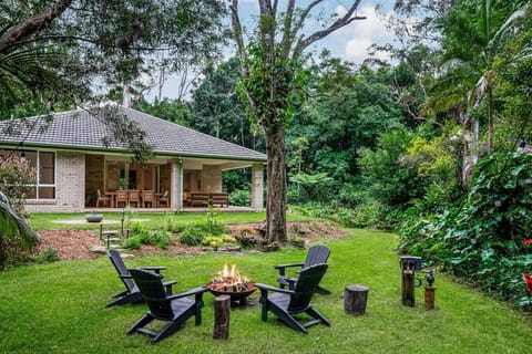 Fire pit area and outdoor balcony with lounge and dining