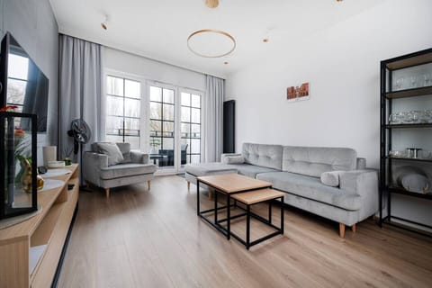 Living Room with Sofa Bed and Smart TV | Book Now with RENTUJEMY.COM