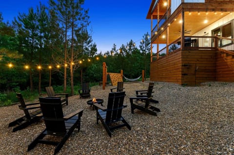 Outdoor Gathering Space: Gather around the fire pit under twinkling lights for unforgettable evenings!