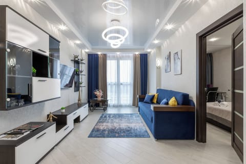 Comfort Apartment, Courtyard View | Living area | 40-inch LCD TV with cable channels