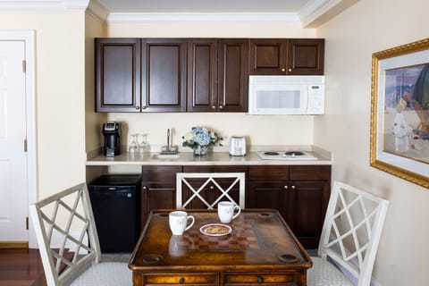 A well-appointed kitchenette offers convenience and charm for a home-away-from-home experience.
