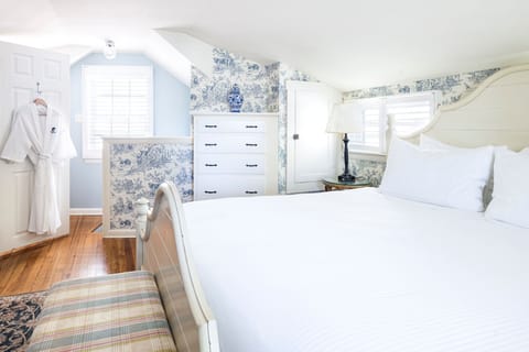 Soft tones and elegant touches create a cozy bedroom designed for ultimate comfort.