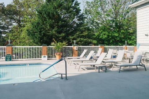 Refreshing dips and shaded lounging await in this secluded poolside escape, designed for ultimate relaxation.