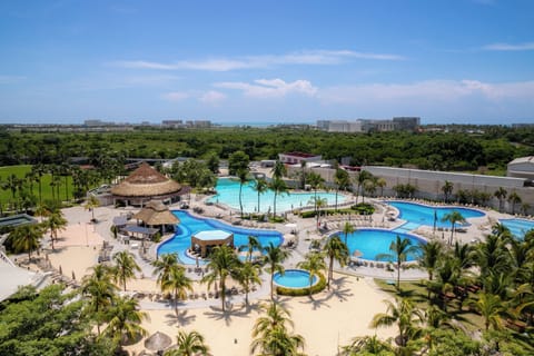 6 outdoor pools, open 8:00 AM to 8:00 PM, pool umbrellas, sun loungers