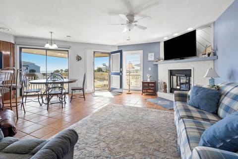 Condo, Multiple Beds, Balcony, Garden View (Tilghman Lakes D4) | Living area | Fireplace