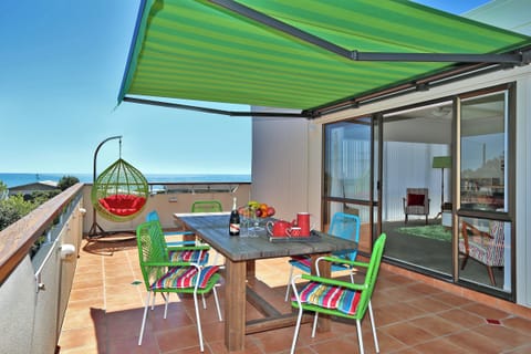Sunny deck located right off the upstairs lounge. Retractable sunshade and BBQ 