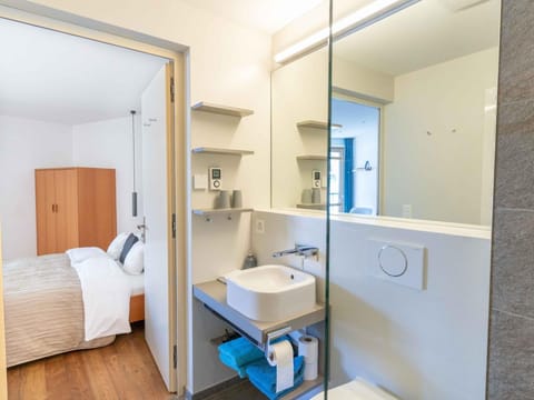 Basic Double Room, Mountain View | Bathroom | Eco-friendly toiletries, hair dryer, towels, soap