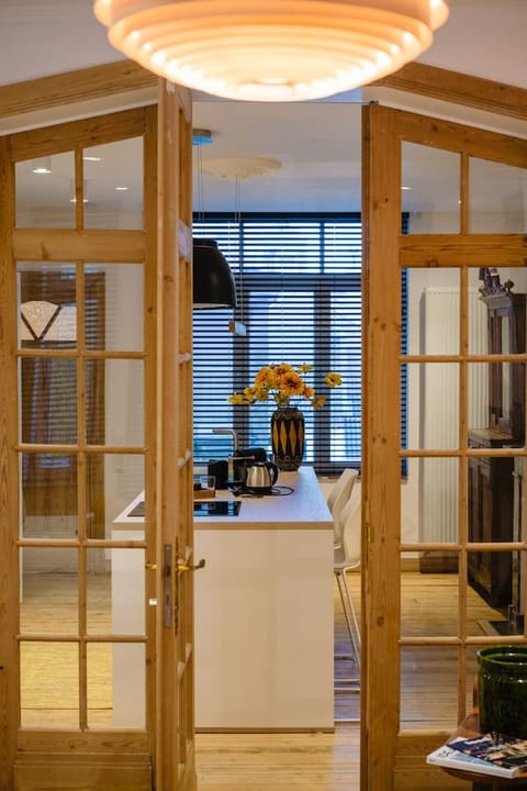 Spacious suite with dining table and connected rooms