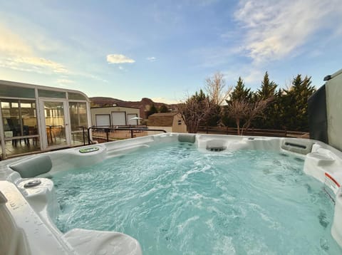 Soak in the private hot tub after a day of exploring Southern Utah. This neighborhood location offers amazing stargazing right from the back yard. 
