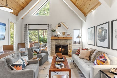 Living room with outdoor view and balcony 
