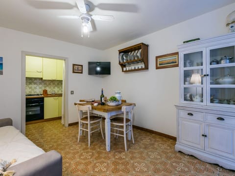 Furniture, Wood, Interior Design, Flooring, Kitchen, Cabinetry, Floor, Room, Major Appliance, Cupboard