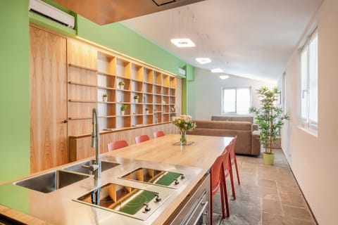 Family Apartment, 3 Bedrooms, City View | Private kitchen | Fridge, microwave, oven, stovetop