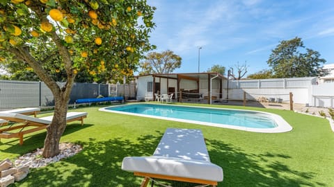 Take a refreshing dip in the shared pool, surrounded by serene greenery and blue skies #refreshing #serene #portugal #pt #albufeira