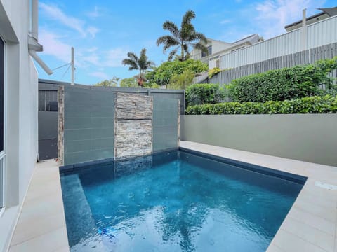 Peaceful poolside oasis designed for relaxation and fun.