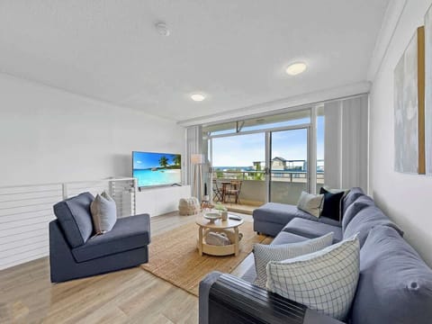 The living area welcomes you with an L-shaped lounge and breeze open layout.