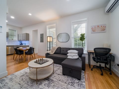 Step into our adorable living room, designed to provide a cozy and cute vibe, allowing you to relax and rejuvenate from your hectic routine. 