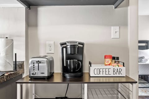 Kitchenette: Efficient & Stylish – A modern kitchenette for easy meal prep.