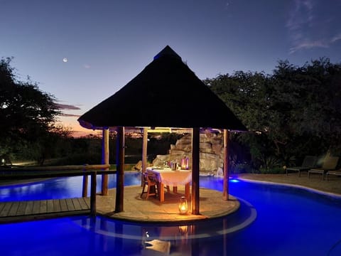 Outdoor pool, pool umbrellas, sun loungers