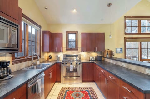 Kitchen: Third floor, drip coffee maker, Keurig, toaster, french press cooking utensils, tableware