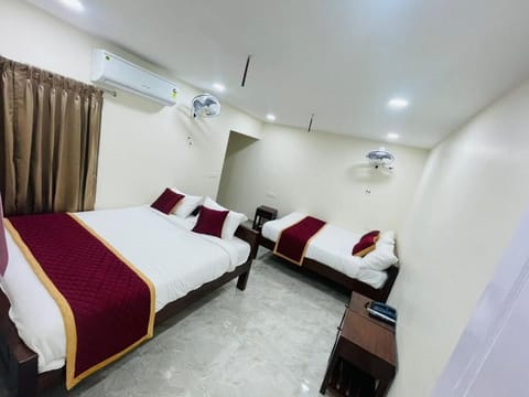 Deluxe Quadruple Room | Premium bedding, free WiFi, bed sheets