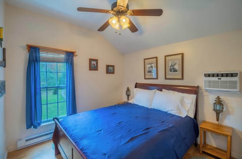 This bedroom features a queen sized bed and full bathroom right off of the bedroom. 