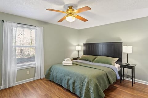 Inviting master bedroom featuring a comfortable bed, matching nightstands, and gentle lighting. A peaceful space designed for restful nights and slow mornings.