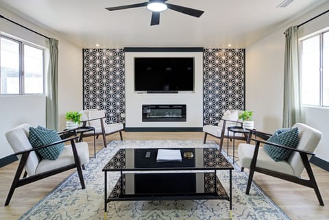 Comfortable seating for 6, 75" TV with Netflix, Sound Bar & Fireplace.