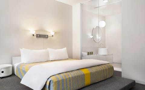 Sink into crisp linens for a calm, restorative night