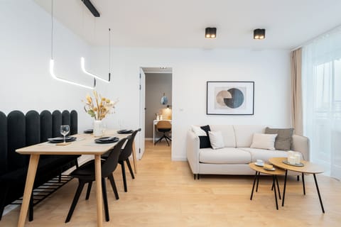 Deluxe Apartment, Balcony, City View | Living area | 50-inch Smart TV with cable channels, Netflix, streaming services
