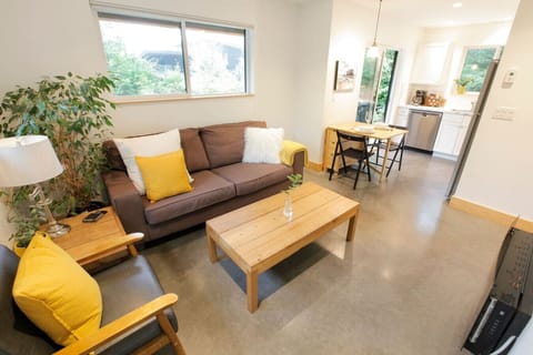 Open concept floorplan with living, dining and kitchen areas shown here.