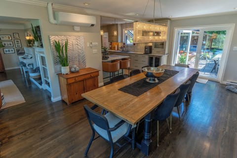 Large dining room that opens to living room, kitchen and the backyard.