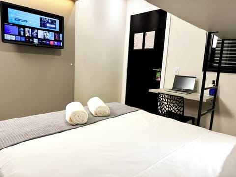 Minibar, desk, laptop workspace, blackout drapes