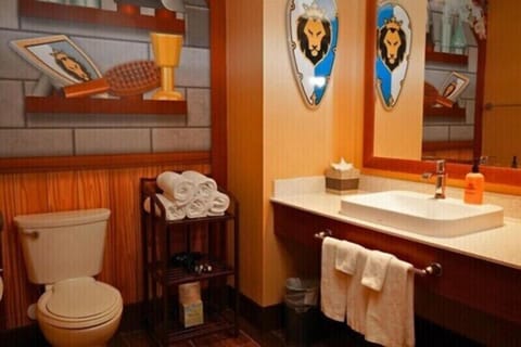 Knights & Dragons Deluxe Room at Castle Hotel | Desk, laptop workspace, blackout drapes, iron/ironing board