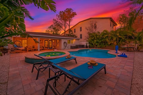 Soak, swim & lounge under cotton candy skies in your private retreat.