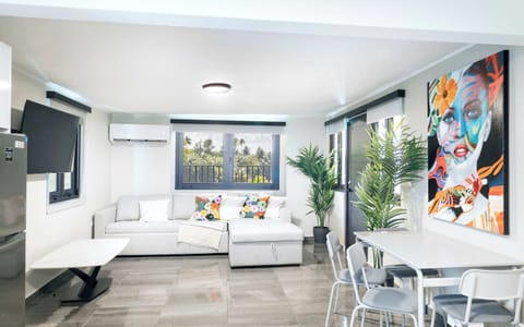 Living / Dining Area with Sofa Bed