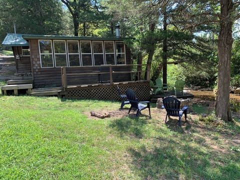 Ms Halls Cabin with wrap around decks overlooking the creek