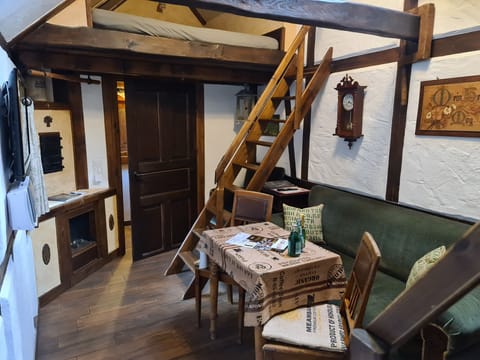 Classic Apartment, Balcony | Living area | Flat-screen TV, DVD player