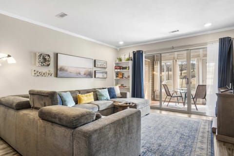 Curl up on the plush living room sectional & enjoy a movie night at home