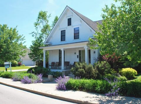 The front porch and house from the street
