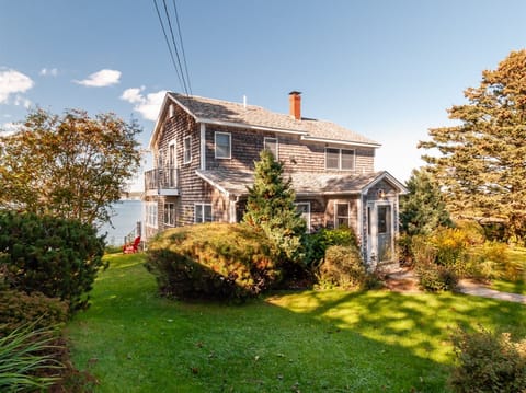 View of the house upon arrival surrounded by beautiful gardens