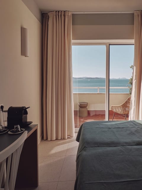 Double Room, Balcony, Sea View | Desk, laptop workspace, soundproofing, iron/ironing board