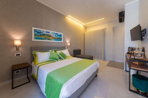 Deluxe Room, Balcony | In-room safe, blackout drapes, soundproofing, iron/ironing board