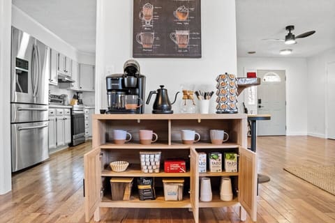 Coffee station with Keurig cups, Decaf, Tea, Hot Chocolate, Creamer, Sugar, and To-go cups. We provide a starter amount of items for your convenience.
