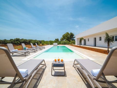 Blue, Composite Material, Swimming Pool, Design, Landscaping, Meteorological Phenomenon, Resort, Cumulus, Hotel