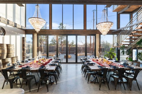 Large window wall lets in ample amounts of sunshine and makes beautiful rainbows through the chandeliers.
