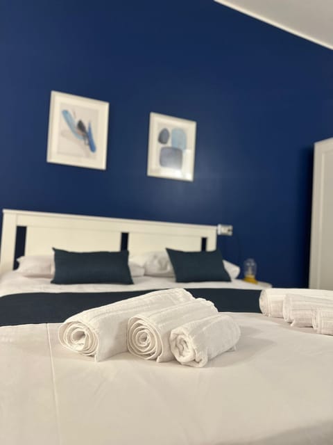 Deluxe Triple Room, Balcony | In-room safe, desk, blackout drapes, free WiFi