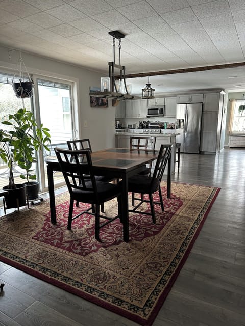 Dining area opens up to back deck
