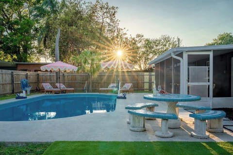 Outdoor Oasis: Dive into relaxation by the pool with sun-kissed loungers and vibrant umbrellas!