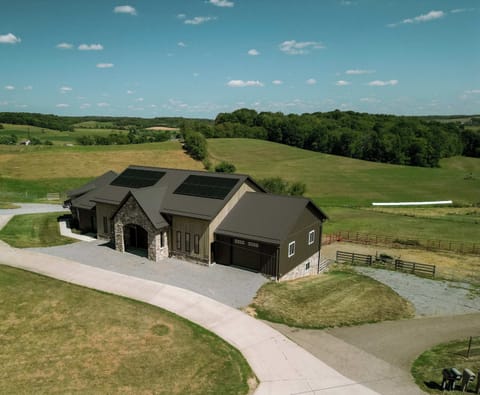 Enjoy scenery of Ohio's Amish country with rolling hills and horses. 